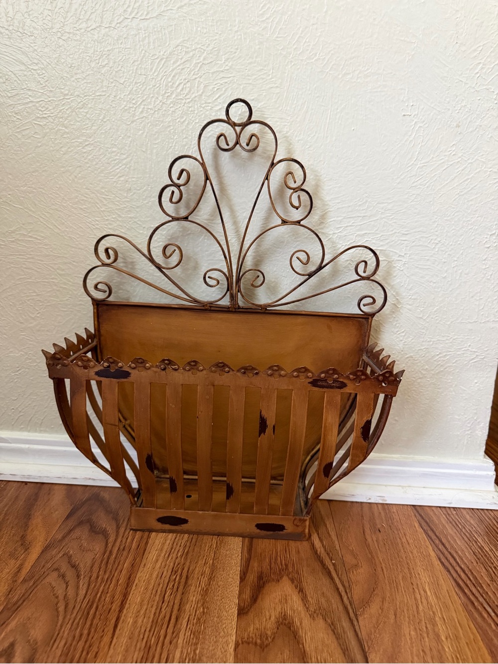 Rustic Brown Metal Wall Planter with Scrollwork